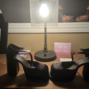 Black platform heel shoes